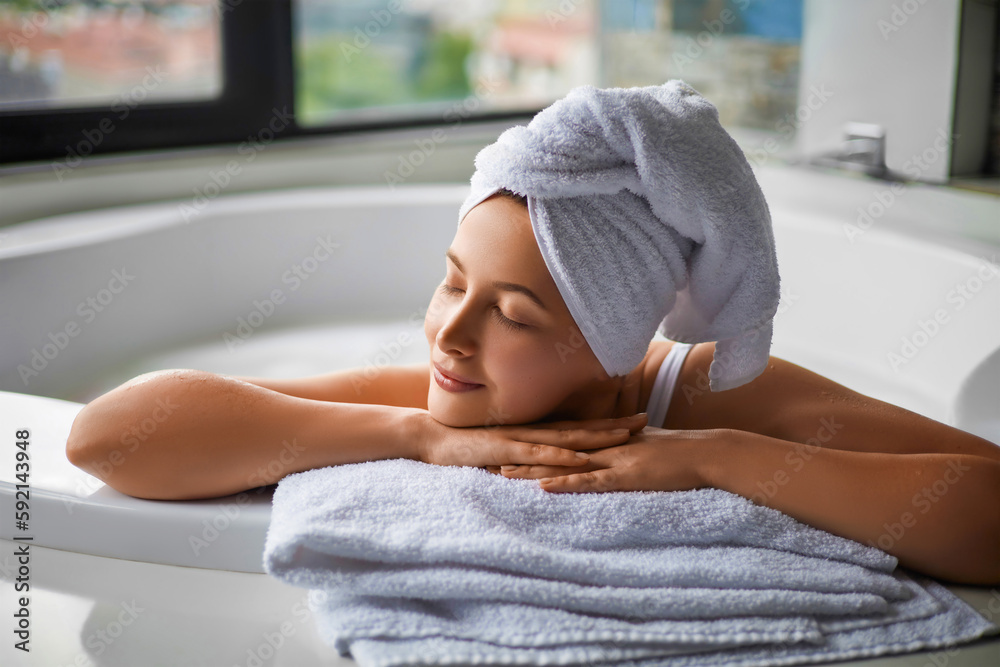 Beauty Procedure Woman Relaxing In Jacuzzi With Closed Eyes And A beauty-procedure-woman-relaxing-in-jacuzzi-with-closed-eyes-and-a