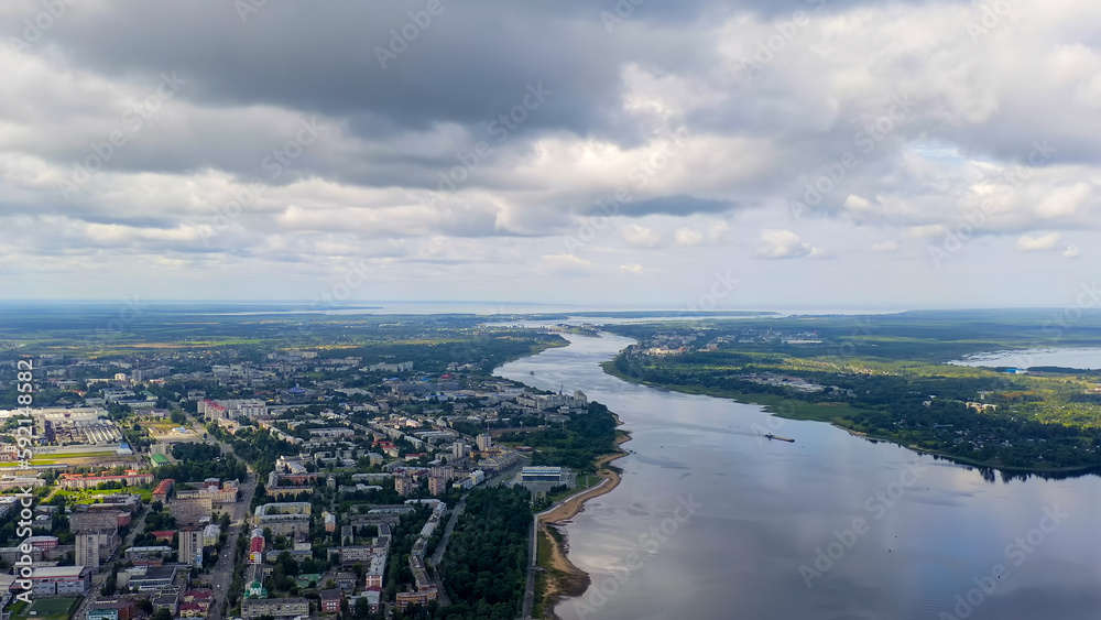 Rybinsk, Russia. Volga river, on the horizon the system of locks of the Rybenskoye reservoir, Aerial View