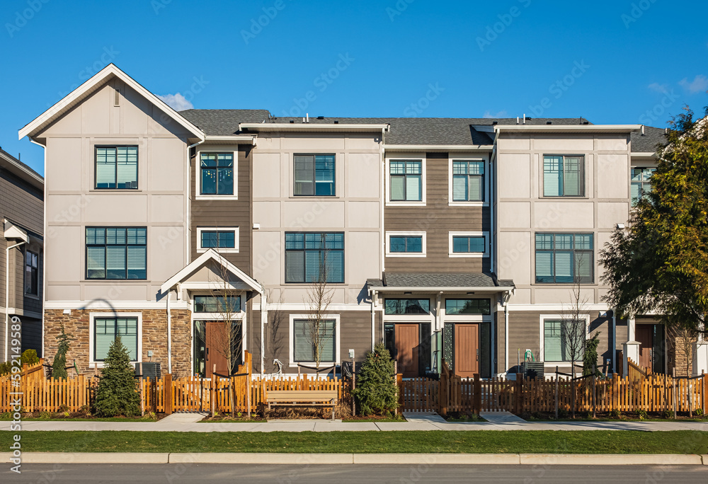 Obraz premium New residential townhouses. Modern apartment buildings in Canada. Modern complex of apartment buildings