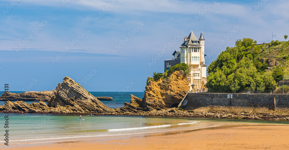 Villa Belza and rocks of the Cote des Basques beach in Biarritz, France on a summer day
