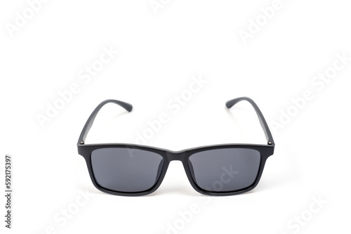 Black unisex sunglasses with polarized lenses, photographed against a white background. © Pavlo