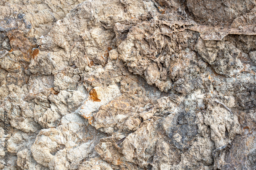 Background of stone wall texture. Close-up of stone surface.