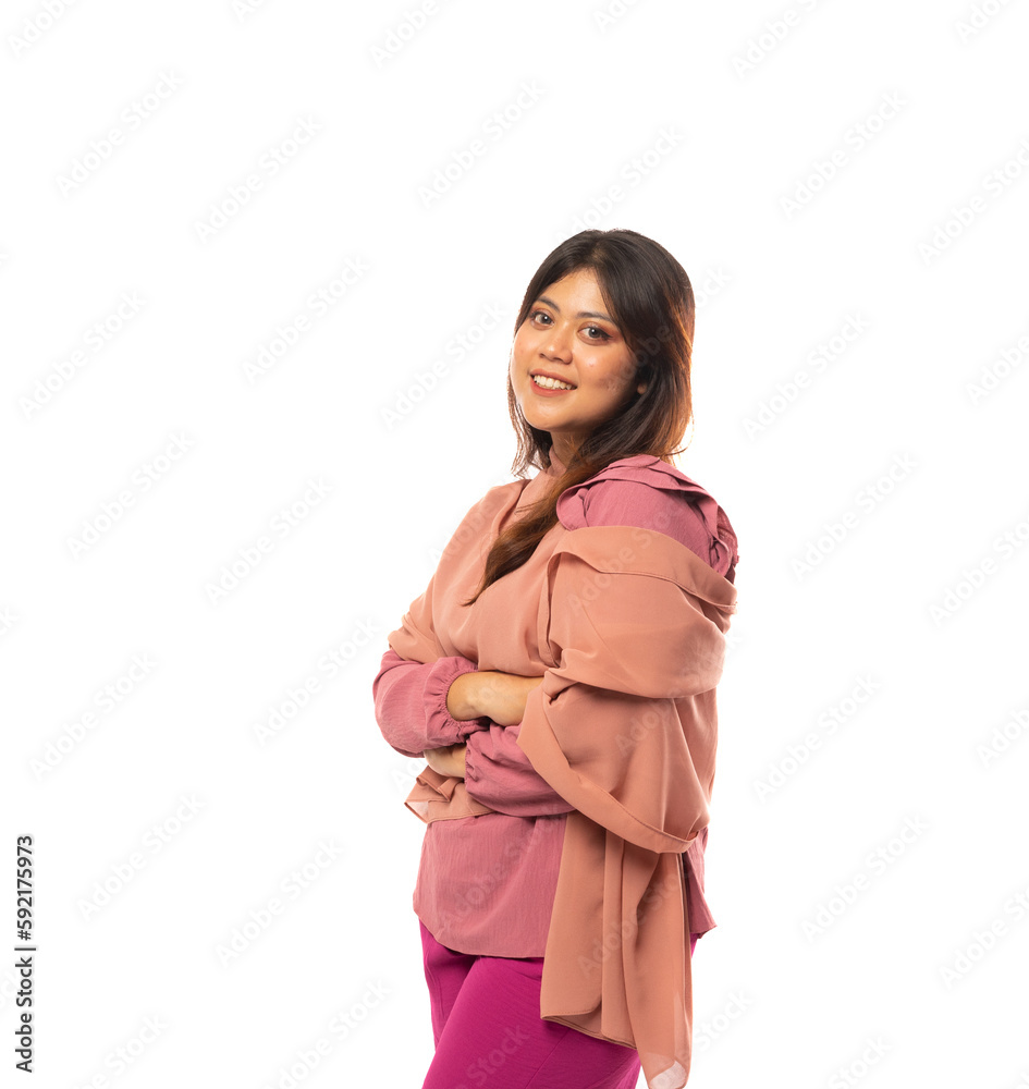 portrait of Asian girl in hijab standing with crossed hands on an isolated background portrait of Asian girl in hijab standing with crossed hands on an isolated background