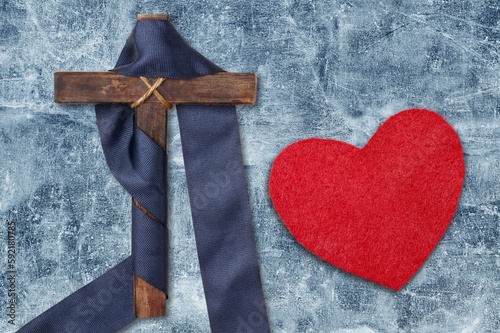Holy Week concepts, heart shape and wooden cross