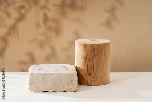 Composition empty podium material wood and glass geometric shape. Pastel beige background. Beautiful background made of natural materials for product presentation.