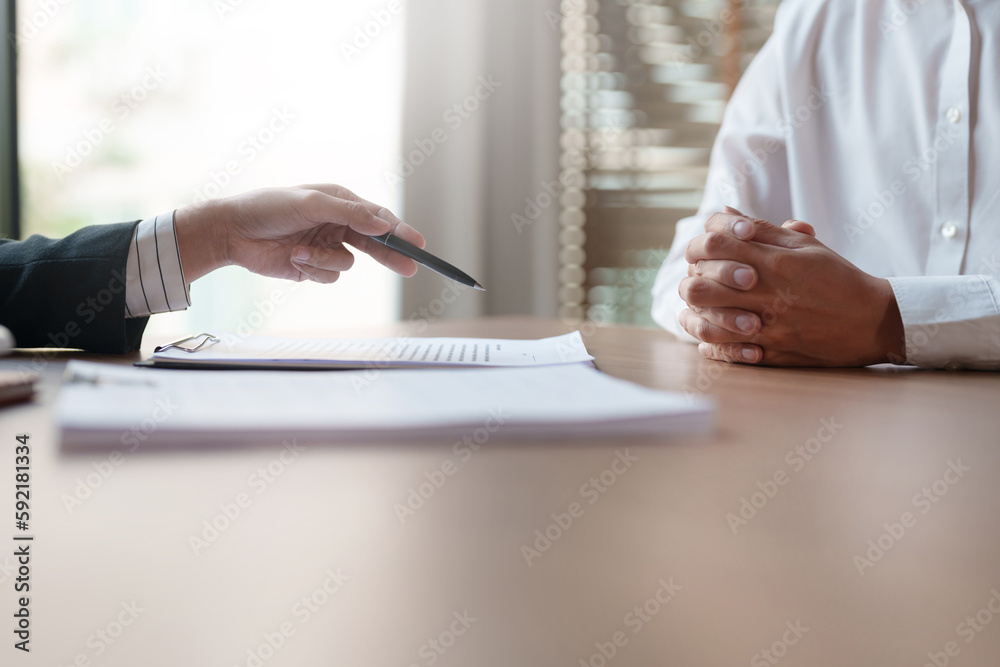 Real estate agent broker and customer with loan or insurance contract documents.. Real estate agent broker and customer with loan or insurance contract documents..