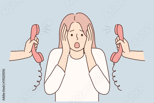 Woman clutches head is nervous about lot of phone calls and intrusive telemarketing or spam