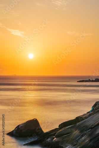 Reefs and Sunrise Scenery at Dongji Island in Zhoushan City, Zhejiang Province, China  On April 9, 2023 photo