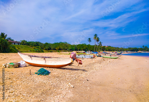 Beautiful tropical landscape with colorful fishing village boats.  Photography for tourism background, design and advertising. 10 January 2023, Sooriya, Sri Lanka