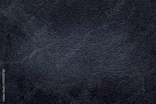 Black Background. Concrete Texture wall painted black. Space for design and text.