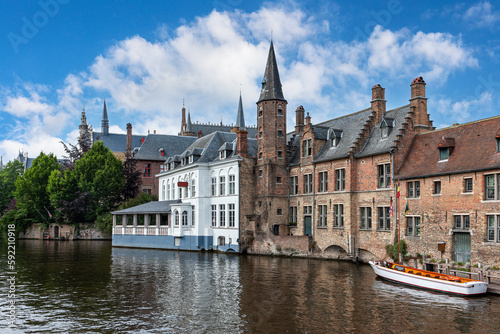 The Dijver canal of Bruges with boat tour, viewing from the Rosary Quay square. Bruges, Belgium