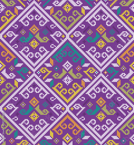 Filipino tapestry folk art - Yakan cloth inspired vector seamless pattern, retro textile or fabric print design from Philippines on purple background
