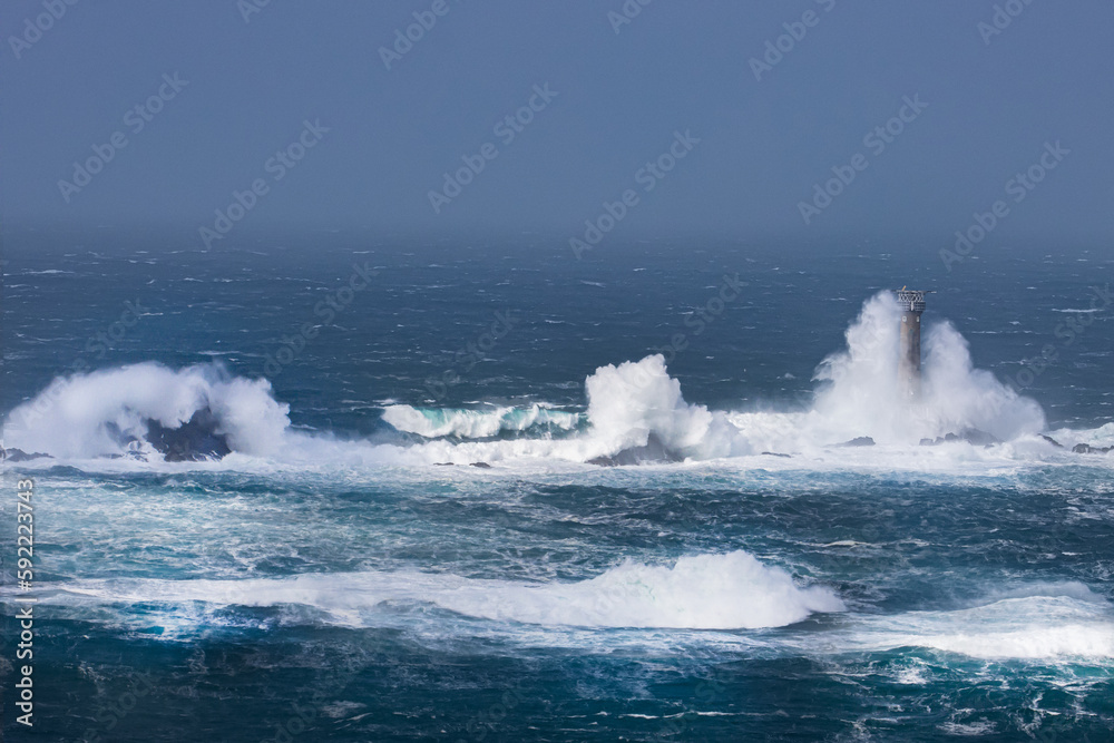 The Longships light house in a storm off Lands End