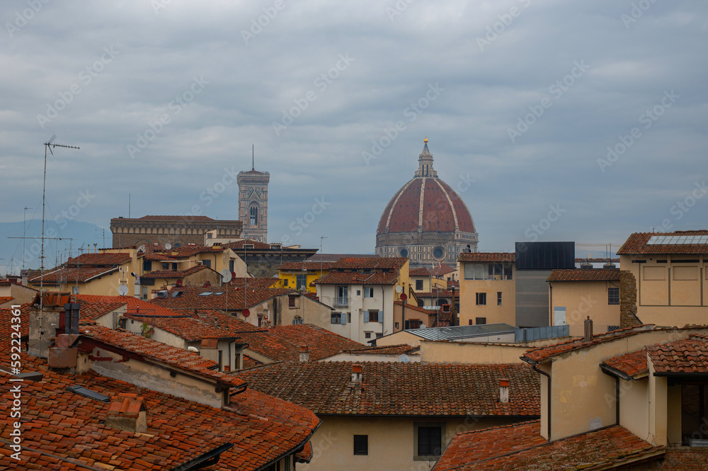 View of Florence Cathedral (Cattedrale di Santa Maria del Fiore) and roofs from the Uffizi Gallery in Florence, Tuscany, Italy