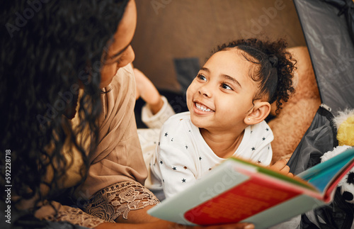 Happy family, mother or child reading story book, cartoon comic books and bonding with mom, mama or parents. Love, youth development and bedtime storytelling for kid listening to fairytale fantasy