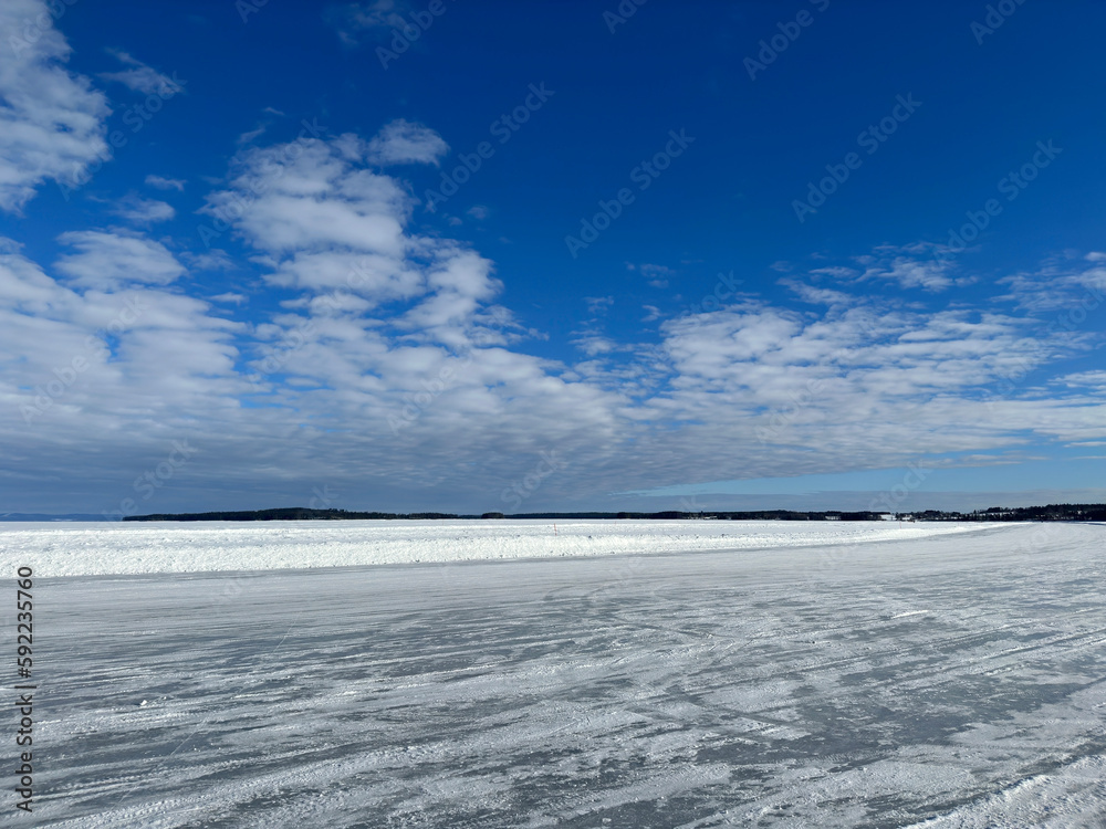 Obraz premium Winter landscape of ice road in north Sweden