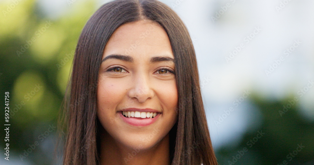 Portrait of a beautiful girl standing and commuting in the city. One happy and stylish young female smiling and relaxing downtown. Trendy young woman showing her teeth, laughing and traveling in town Portrait of a beautiful girl standing and commuting in the city. One happy and stylish young female smiling and relaxing downtown. Trendy young woman showing her teeth, laughing and traveling in town