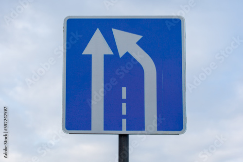 End of lane sign