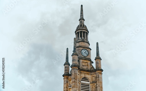 St George's Tron Church under blue bright sky in Glasgow