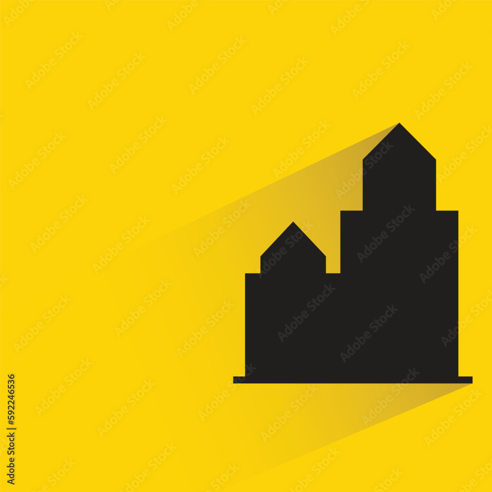 office tower with shadow on yellow background