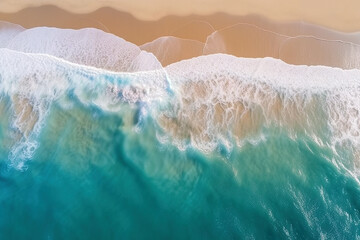 Ocean waves on the beach as a background. Beautiful natural summer vacation holidays background. Aerial top down view of beach and sea with blue water waves