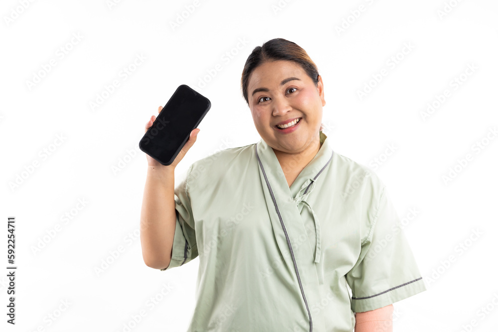 Female patient show and point mobile phone. Happy smiling asian women patient on white background. Fat and overweight obese woman. online doctor Female patient show and point mobile phone. Happy smiling asian women patient on white background. Fat and overweight obese woman. online doctor