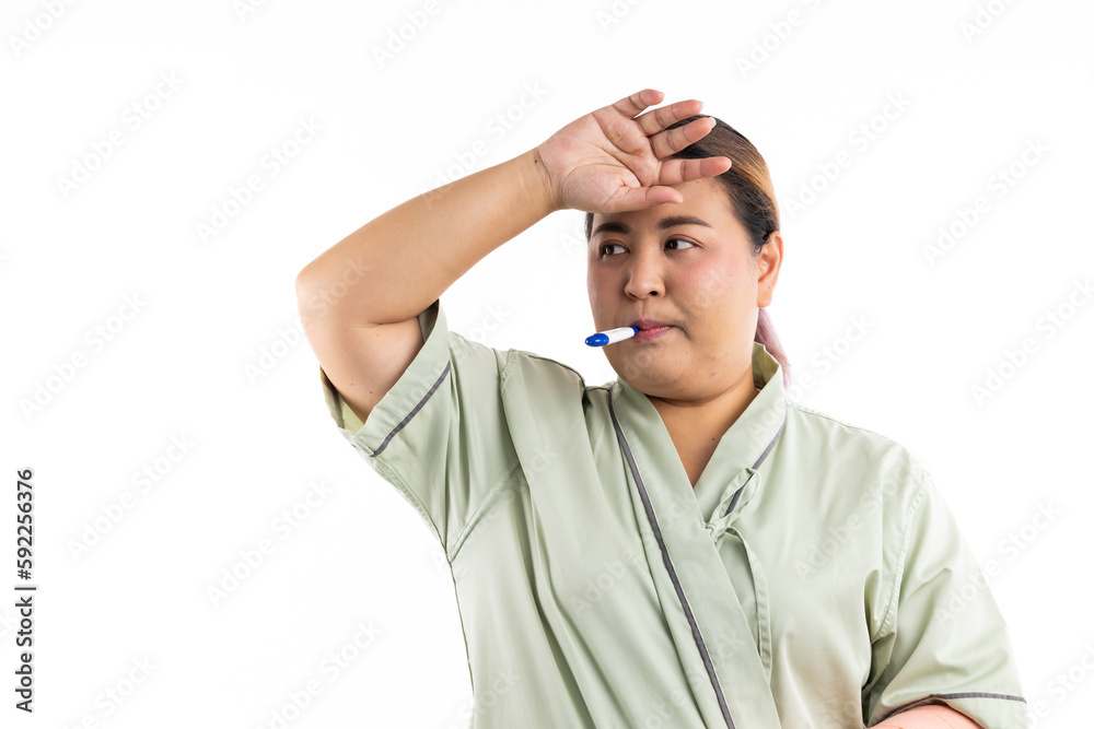 Sick female having fever and headache, flu and check thermometer measure body temperature. Asian women patient on white background. Fat and overweight obese woman Sick female having fever and headache, flu and check thermometer measure body temperature. Asian women patient on white background. Fat and overweight obese woman