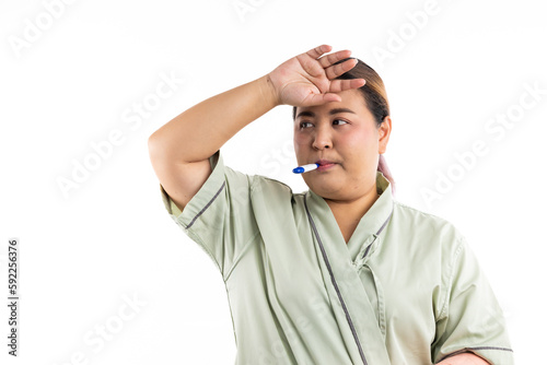 Sick female having fever and headache, flu and check thermometer measure body temperature. Asian women patient on white background. Fat and overweight obese woman