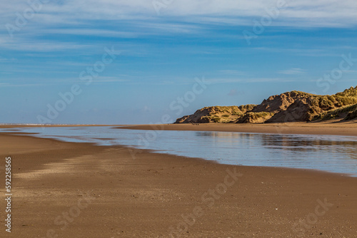 A view along Formby beach on a sunny morning