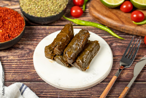 Olive oil leaf wrap. Aegean cuisine delicacies. Grape leaf wrap with rice stuffing. local name zeytinyagli yaprak sarma