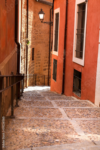 Narrow streets and Facades of historic houses in Toledo