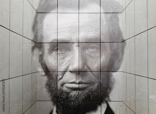 Close-up of a recurring image of Abraham Lincoln on white tile. Double exposure conceptual image of the greatest president in American history. photo