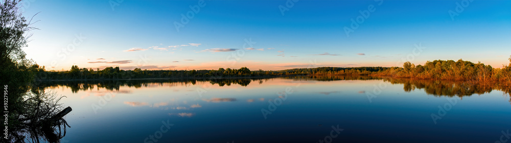Wide panorama of the lake at sunset Wide panorama of the lake at sunset
