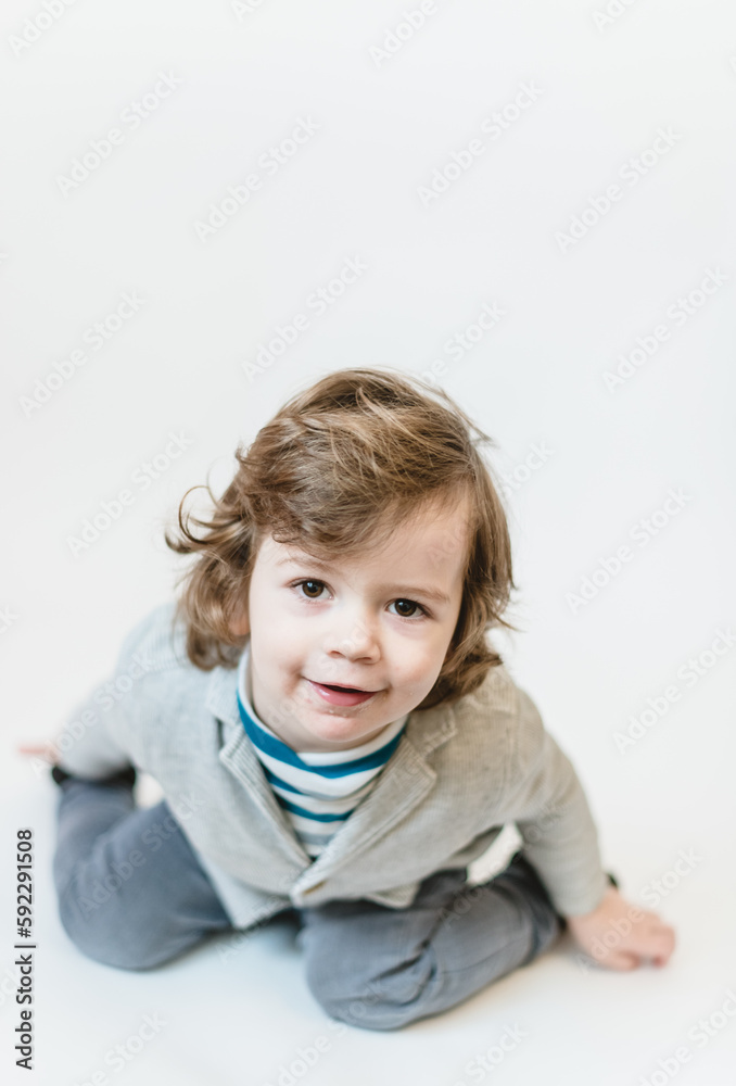 Close-up portrait of child lovely sweet curious cheerful cheery smart clever boy fantasize copy space isolated white color background Close-up portrait of child lovely sweet curious cheerful cheery smart clever boy fantasize copy space isolated white color background