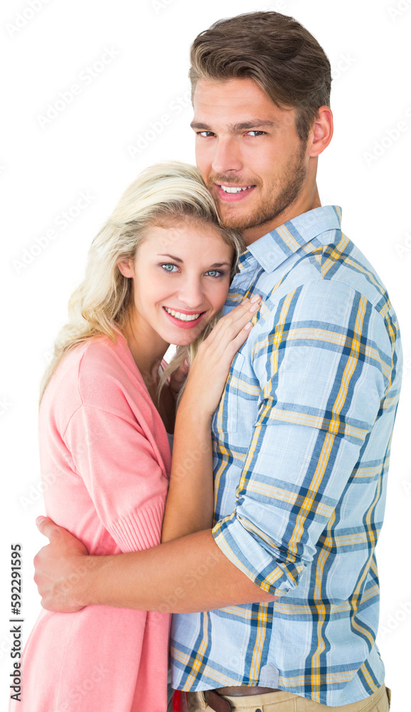 Attractive couple embracing and smiling at camera Attractive couple embracing and smiling at camera