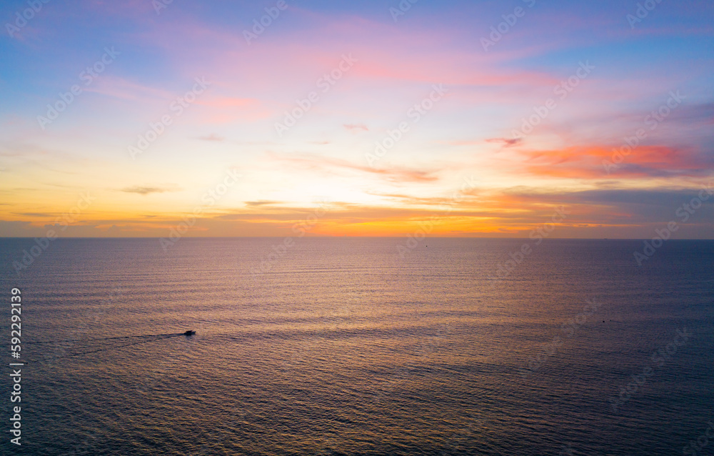 Beautiful Sea in sunset or sunrise light sky over sea in summer season,Image from drone camera,Amazing sea waves ocean sunset sky background
