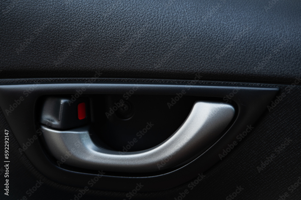 Close up image of new modern car door opener