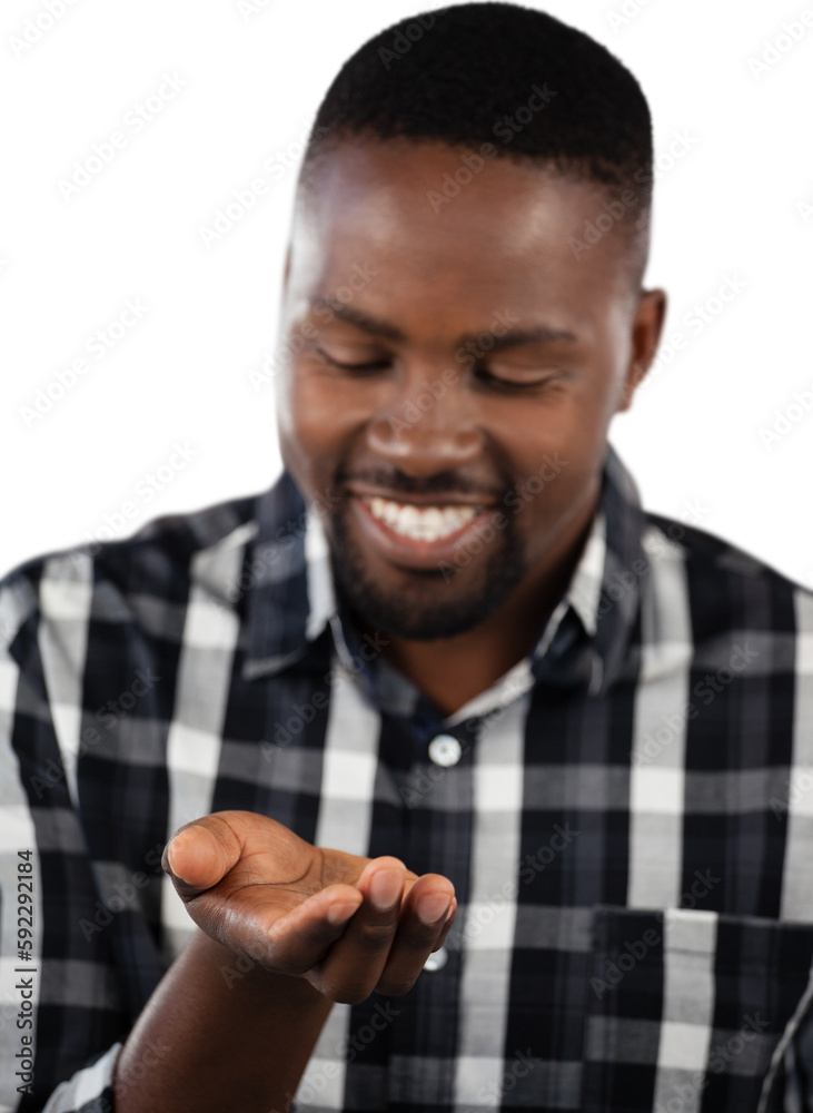 Man wearing checked shirt gesturing against white background Man wearing checked shirt gesturing against white background