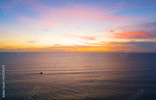 Beautiful Sea in sunset or sunrise light sky over sea in summer season Image from drone camera Amazing sea waves ocean sunset sky background