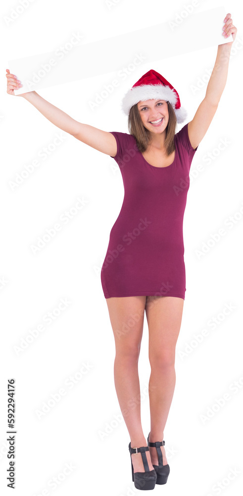 Girl standing upright while holding a poster above her head