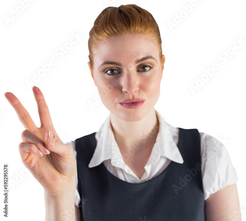 Redhead businesswoman showing peace sign