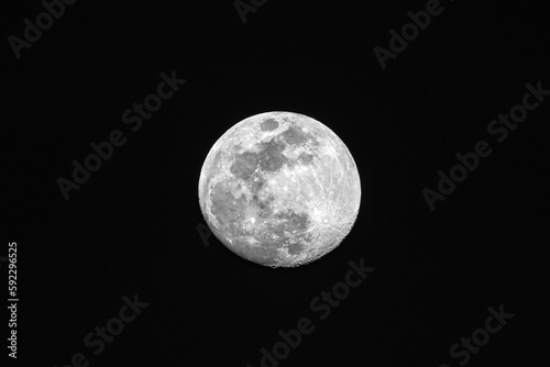 Full moon on the night sky, closeup, can be used as natural background.