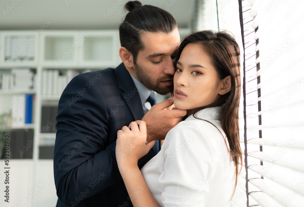 The executive is using his position of power to grope and touch the female employee's body, The concept of harassment and sex in the office. The executive is using his position of power to grope and touch the female employee's body, The concept of harassment and sex in the office.