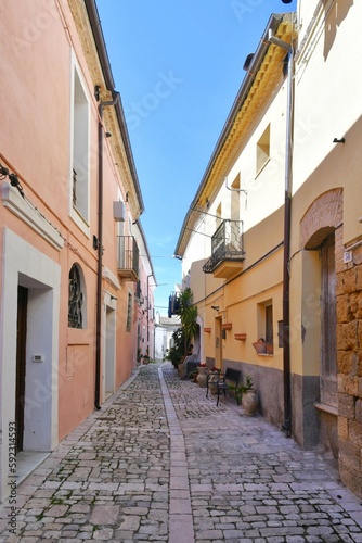 A narrow street among the old houses of Larino  a medieval town in the province of Campobasso in Italy.