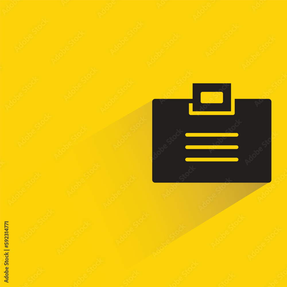 id card badge with shadow on yellow background id card badge with shadow on yellow background