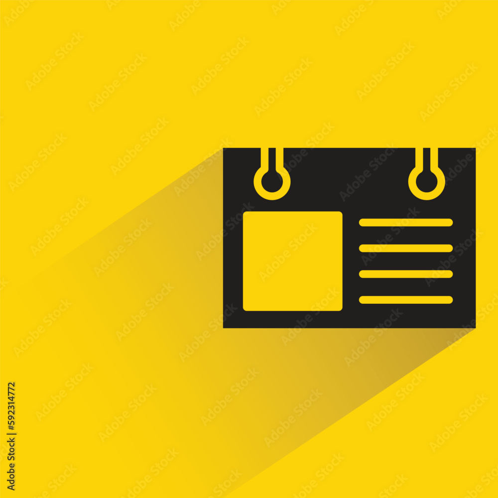 id card badge with shadow on yellow background id card badge with shadow on yellow background