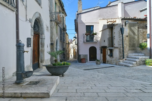 A narrow street among the old houses of Larino, a medieval town in the province of Campobasso in Italy. © Giambattista