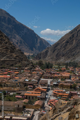 View of the city of Ollantaytambo with the mountains in the background, from the top of the archaeological site, Peru. 