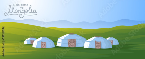 Fotografiet Mongolian yurts on green steppes background.