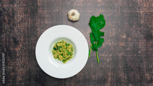 Typical dish of Italian cuisine, orecchiette with turnip greens. Orecchiette with cime di rapa
